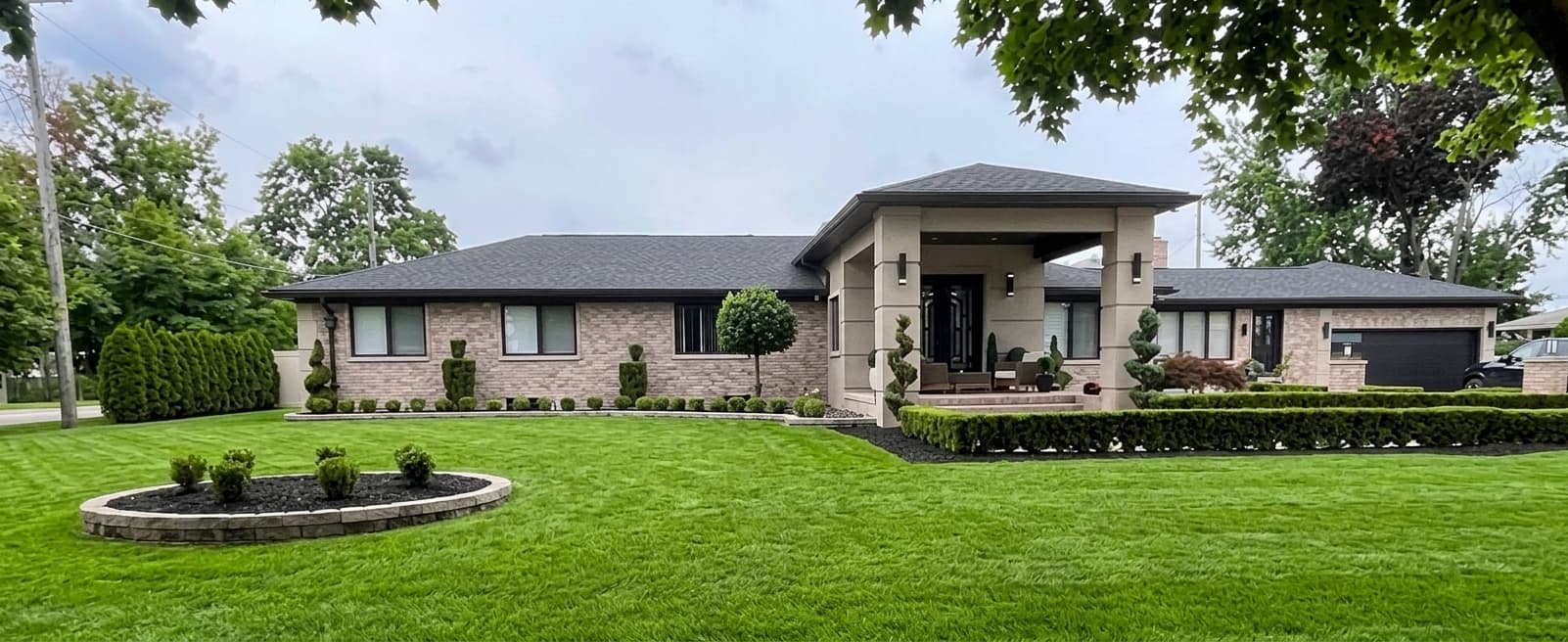 Retaining Wall and boxwood shrubs in Dearborn, Mi